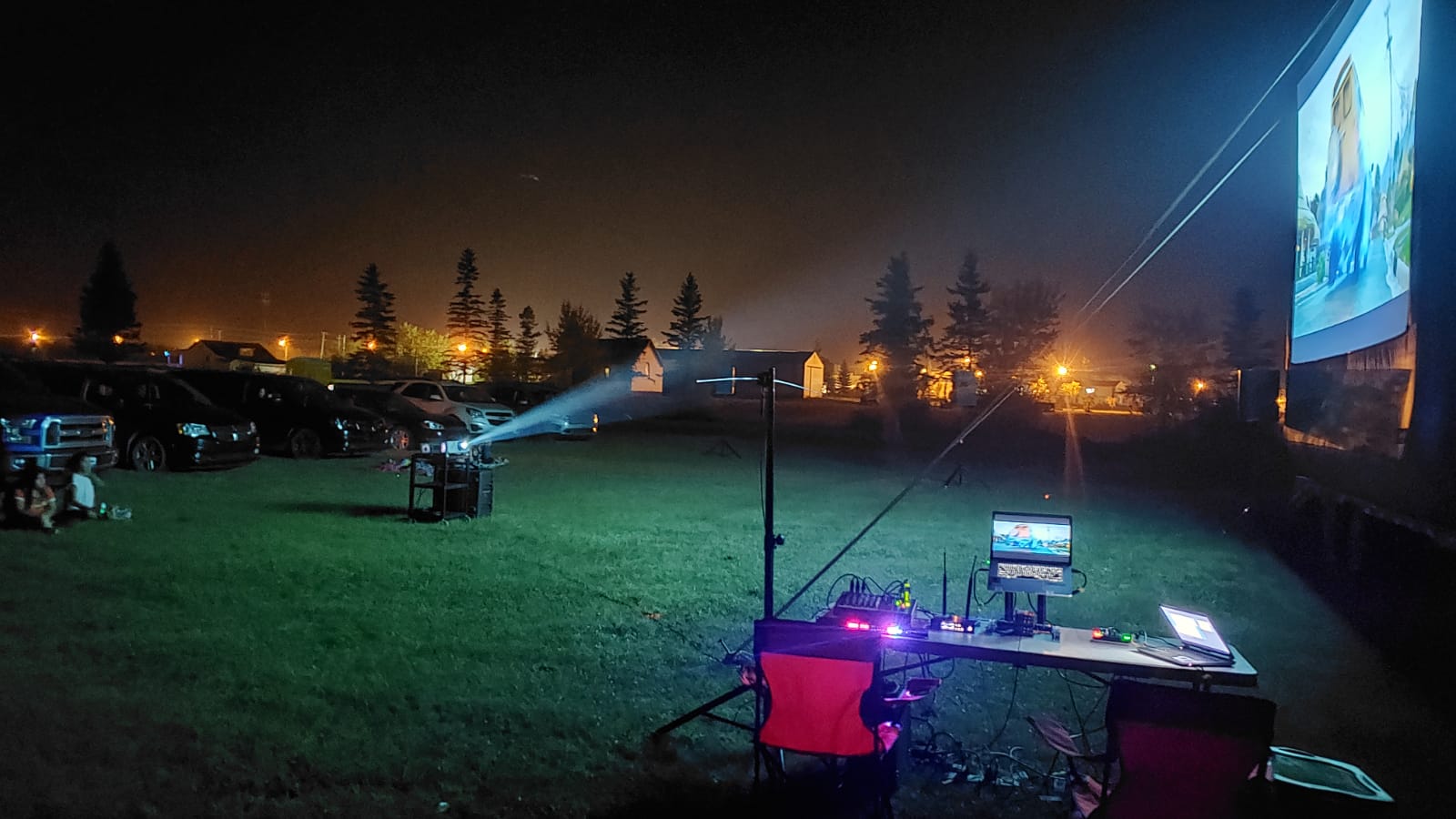 Saskatoon Saskatchewan YXE Pop Up Drive In Movie Screen Outdoor Theatre Cinema Under The Stars Armed With Harmony