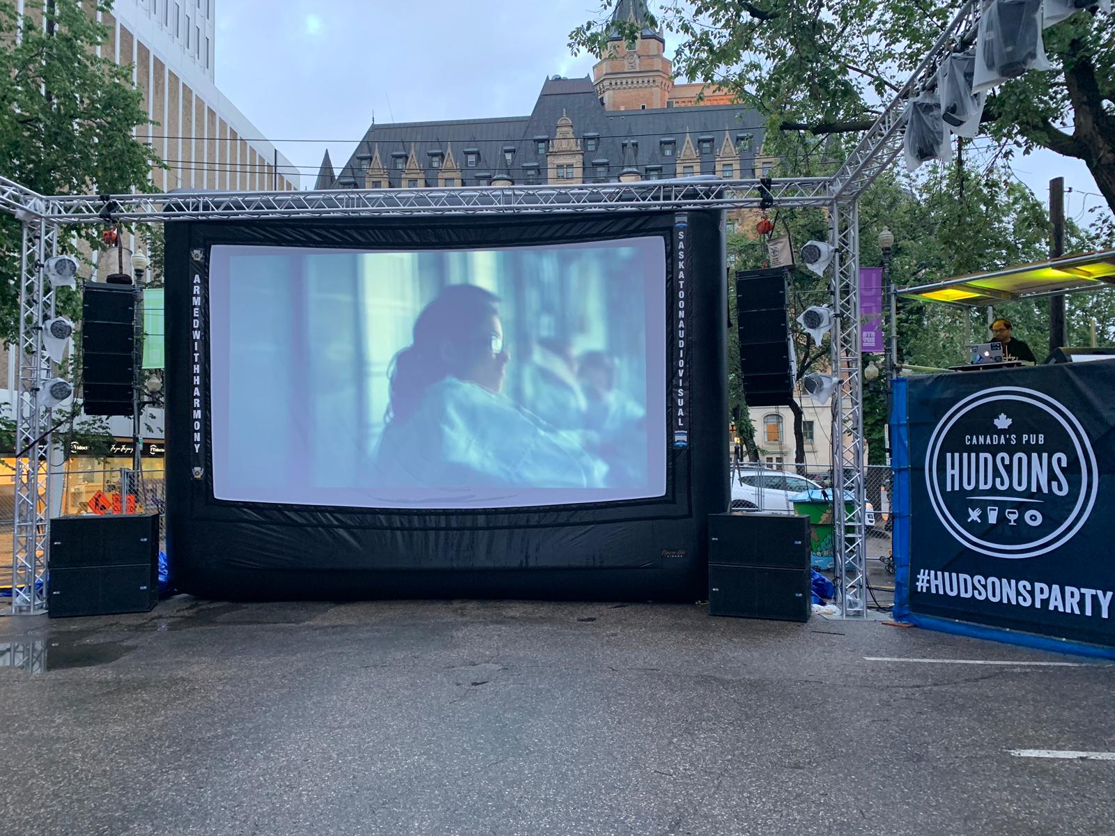 Saskatoon Saskatchewan YXE Pop Up Drive In Movie Screen Outdoor Theatre Cinema Under The Stars Armed With Harmony