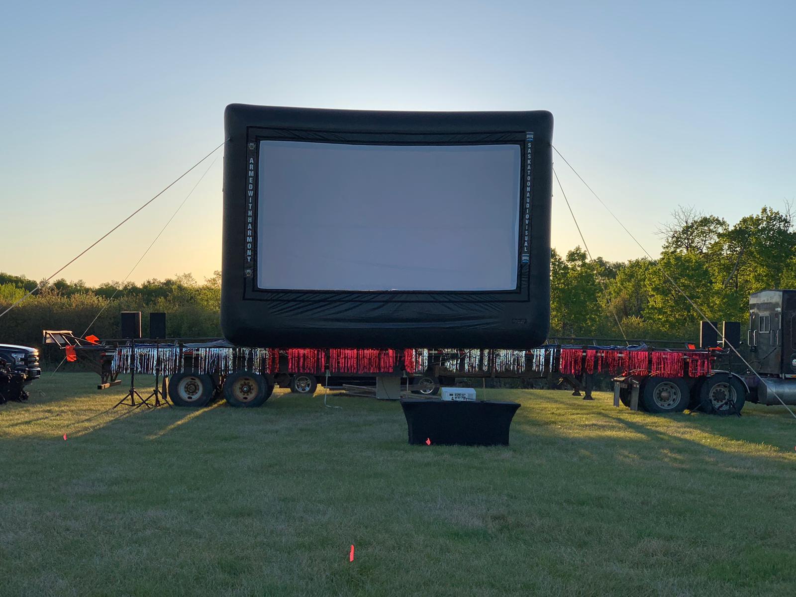 Saskatoon Saskatchewan YXE Pop Up Drive In Movie Screen Outdoor Theatre Cinema Under The Stars Armed With Harmony
