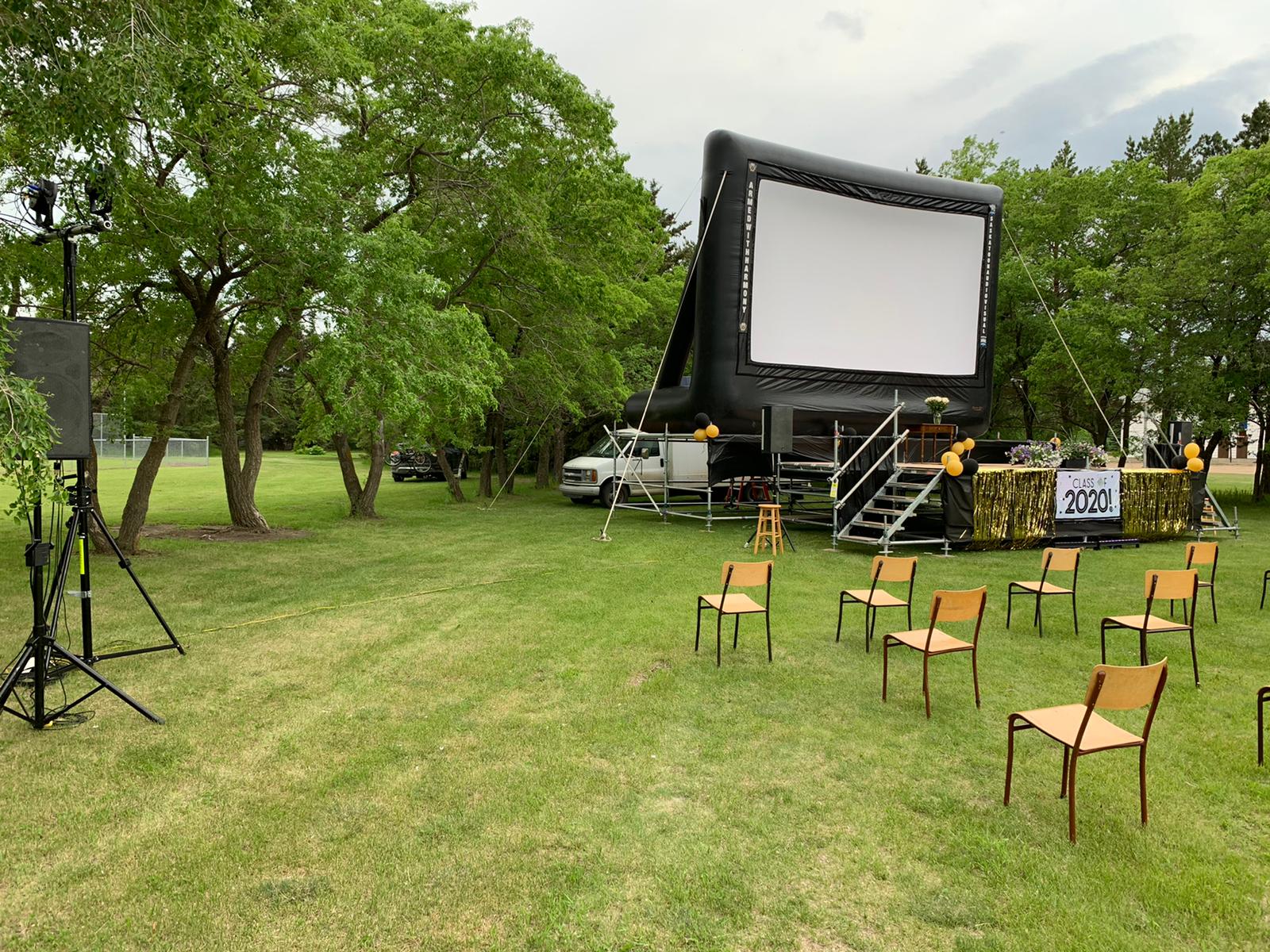 Saskatoon Saskatchewan YXE Pop Up Drive In Movie Screen Outdoor Theatre Cinema Under The Stars Armed With Harmony