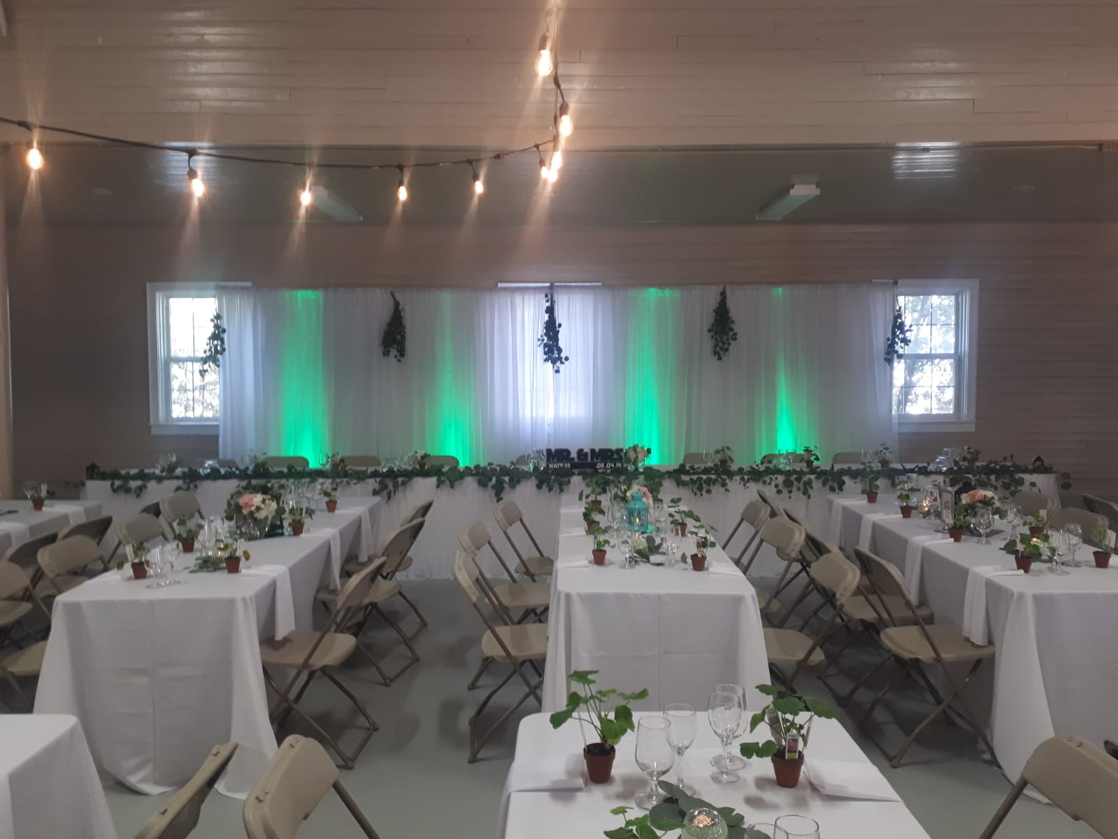 Saskatoon YXE Pipe Drape Rentals Wedding Head Table Backdrop Linen